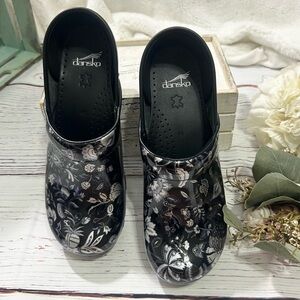 Dansko pro floral print metallic clogs